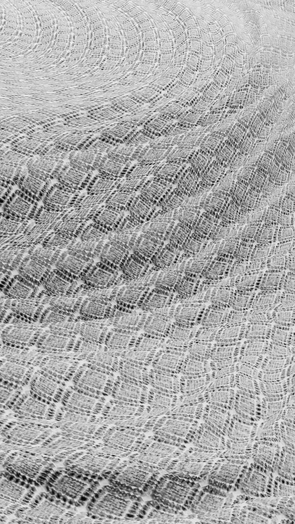 a black and white photo of a textured surface