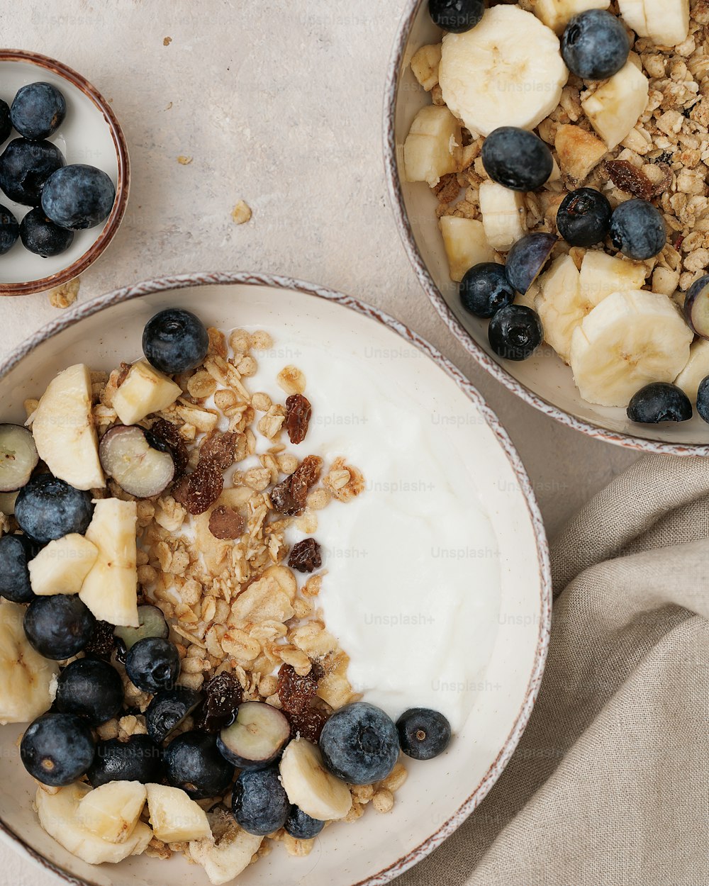 a couple of bowls of food on a table