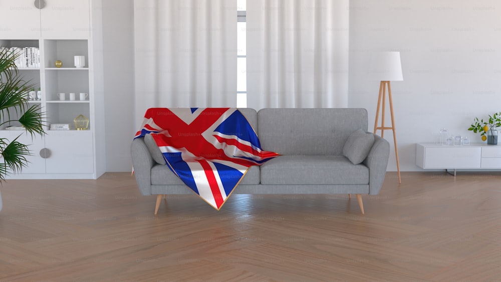 a living room with a couch and a british flag blanket