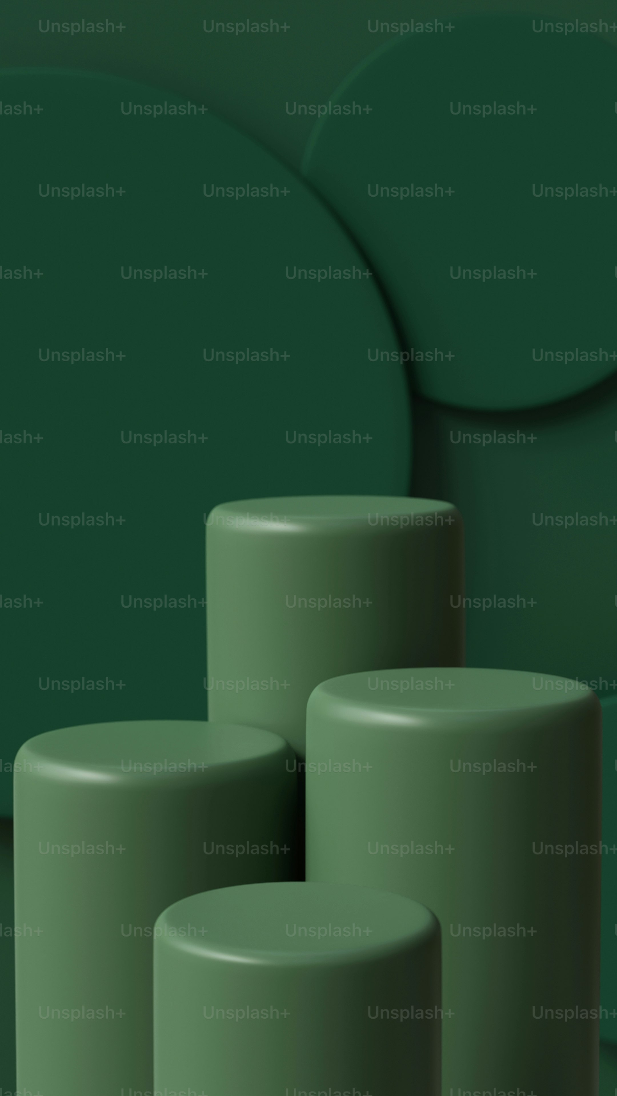 A group of green stools sitting next to each other photo Cylinder