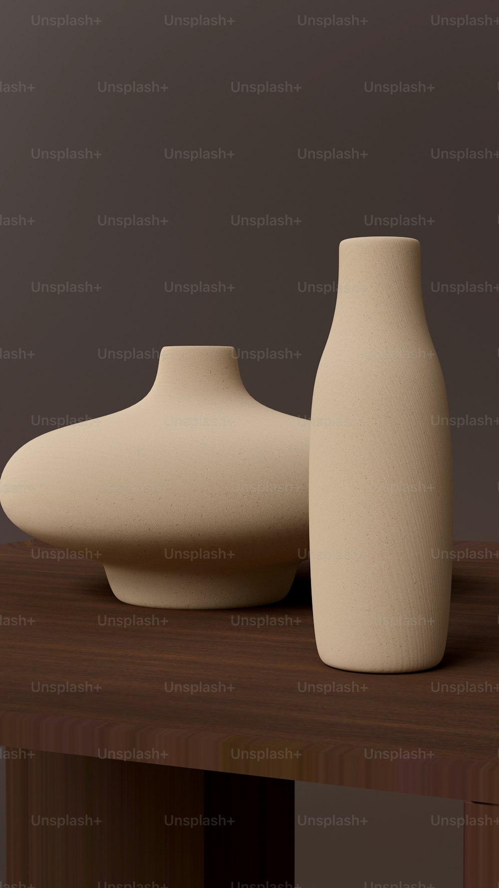 a couple of white vases sitting on top of a wooden table