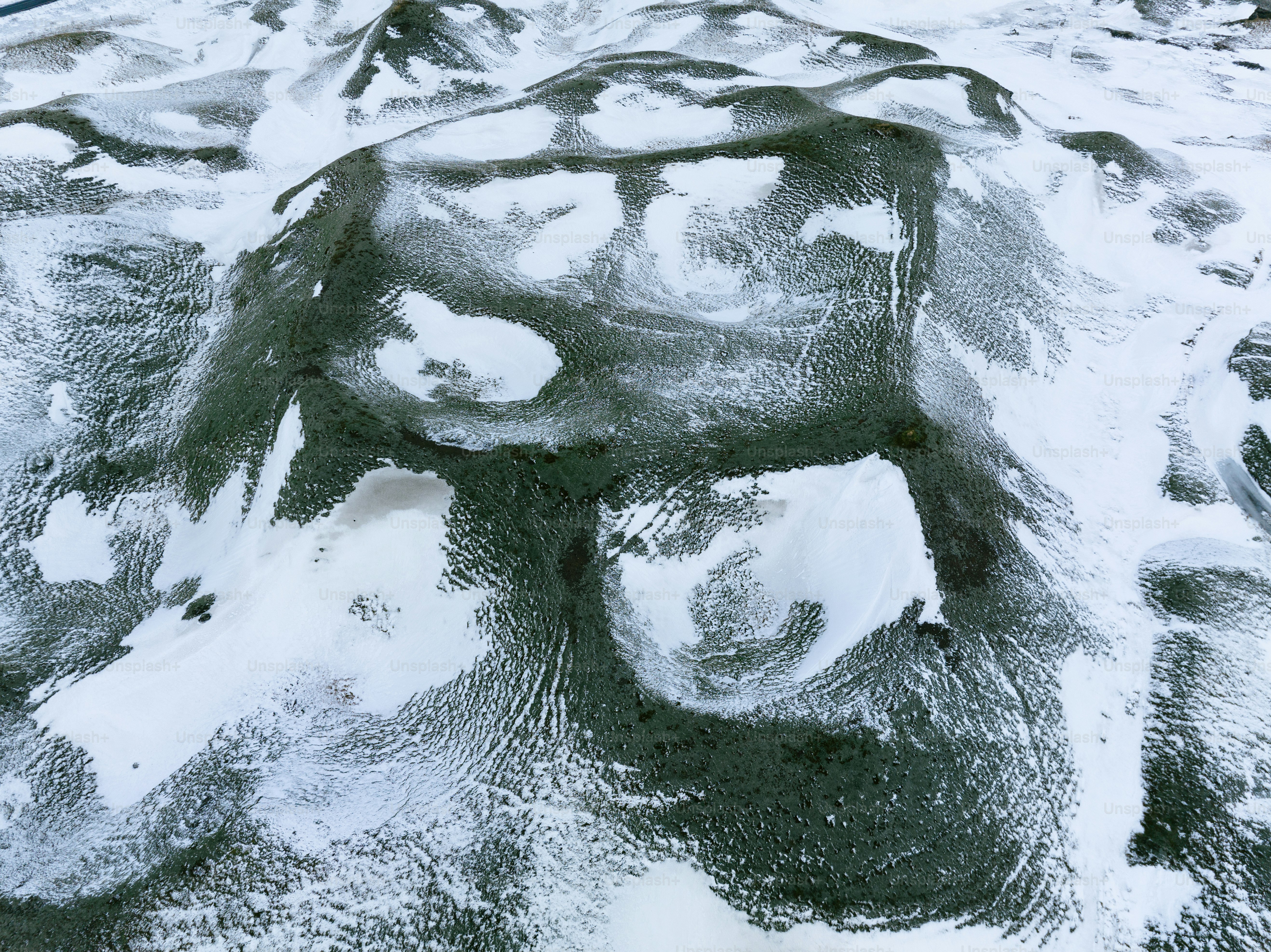 An aerial view of a snow covered area photo – Screen saver Image on ...