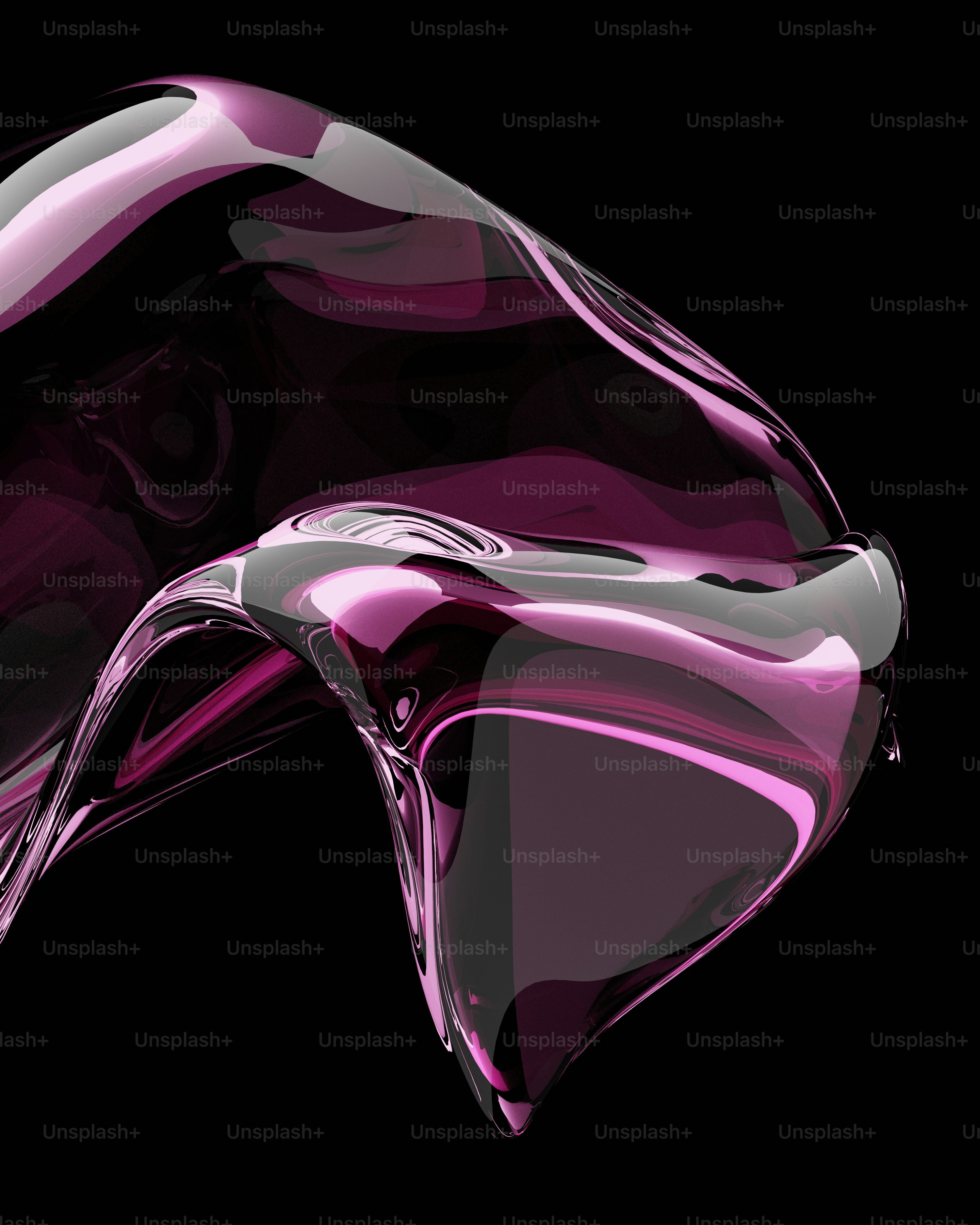 a close up of a purple object on a black background