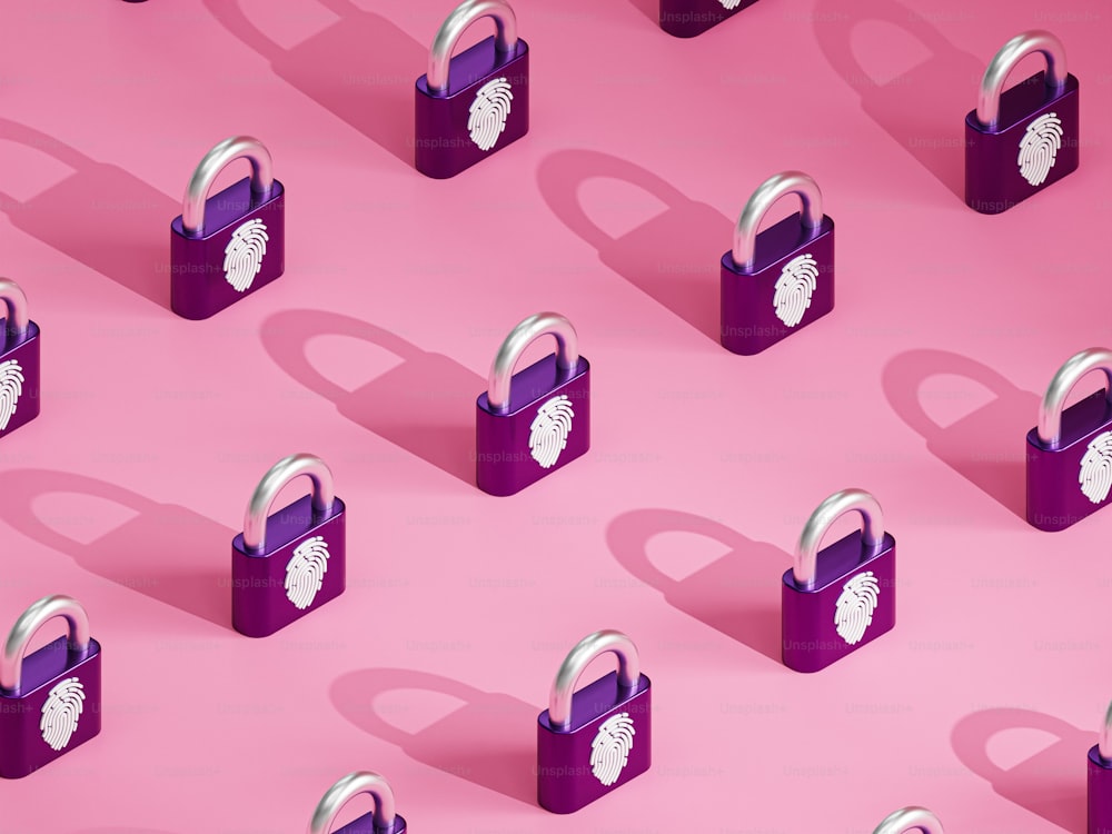 a group of purple padlocks on a pink background