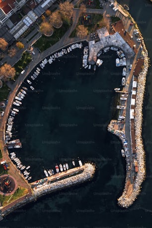 an aerial view of a marina with boats in it