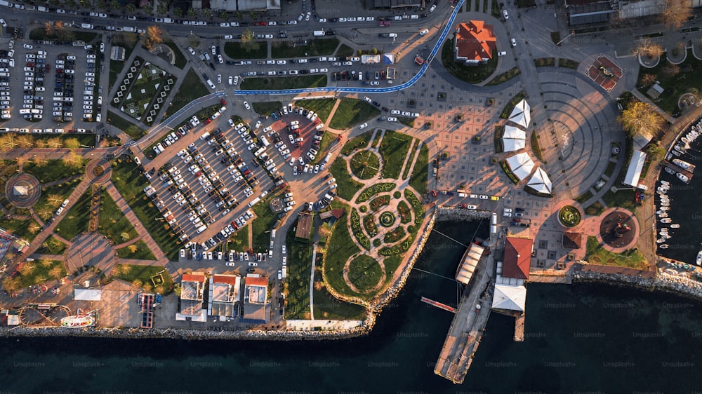 an aerial view of a marina and a city