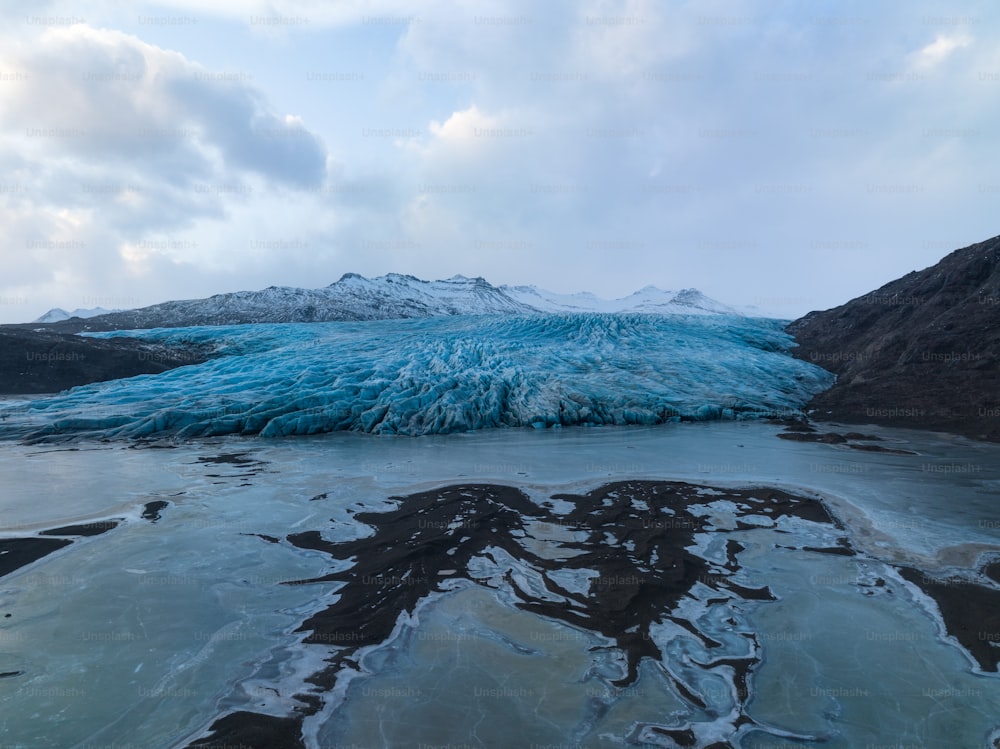 a large iceberg that is floating in the water