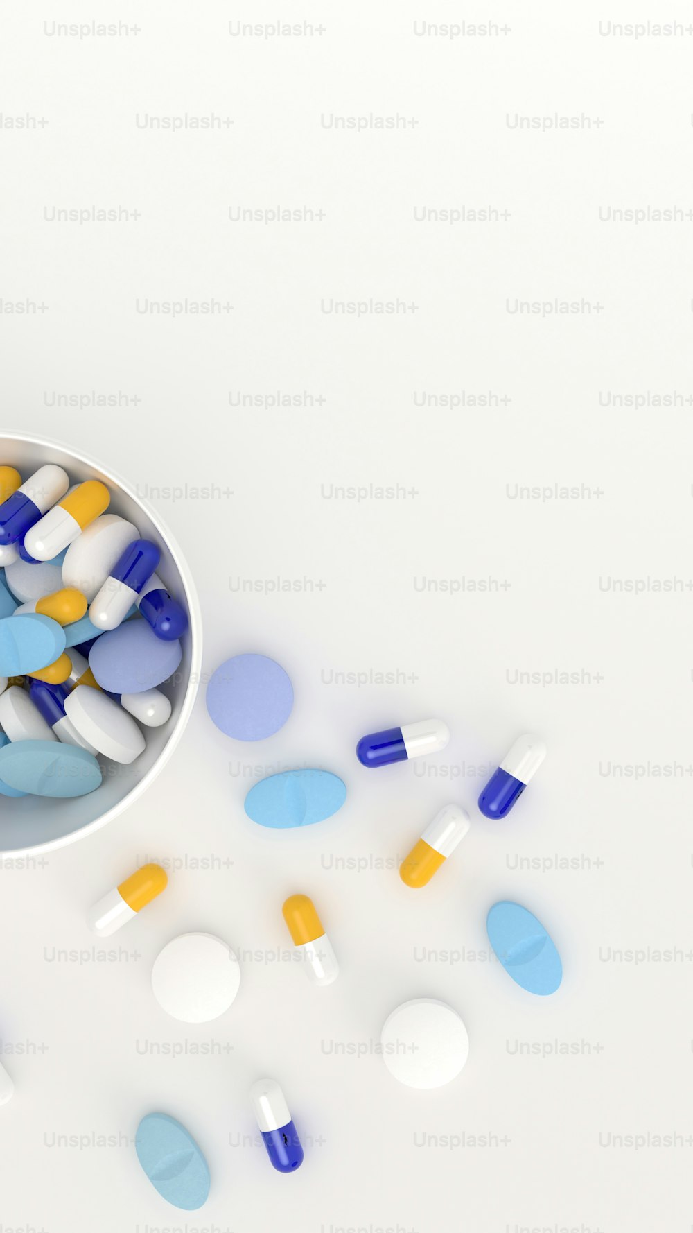 a white bowl filled with blue and yellow pills