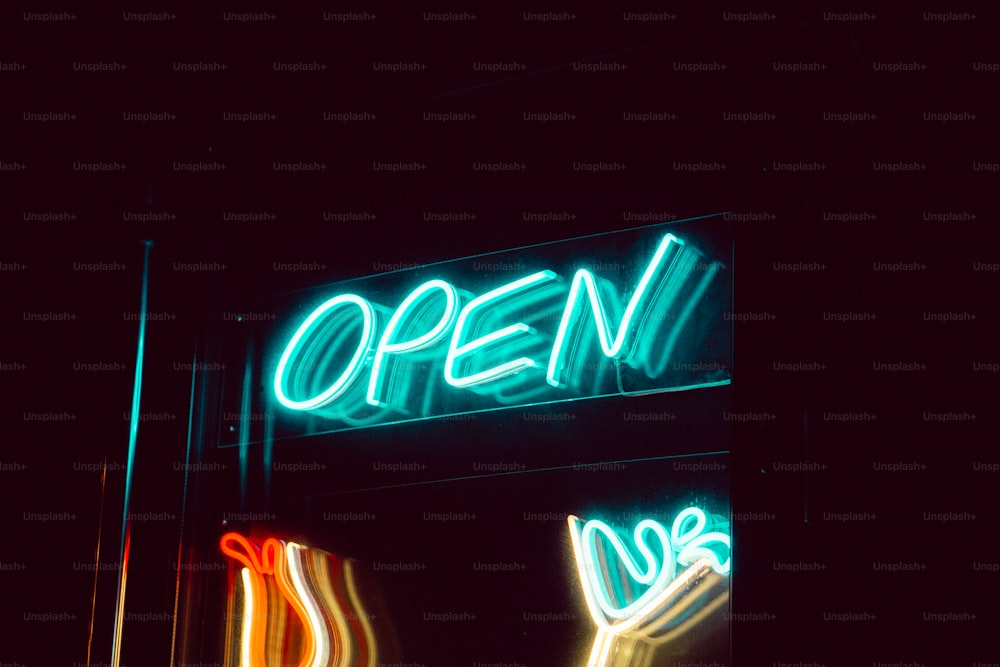a neon sign that reads open and closed