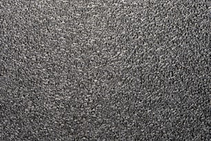 a black and white photo of a textured surface