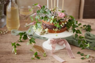 a cake sitting on top of a white cake plate