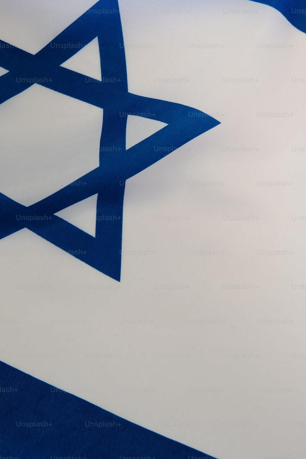 a blue and white flag with a star of david on it