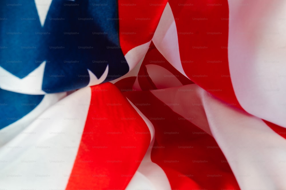 a close up of the american and canadian flags