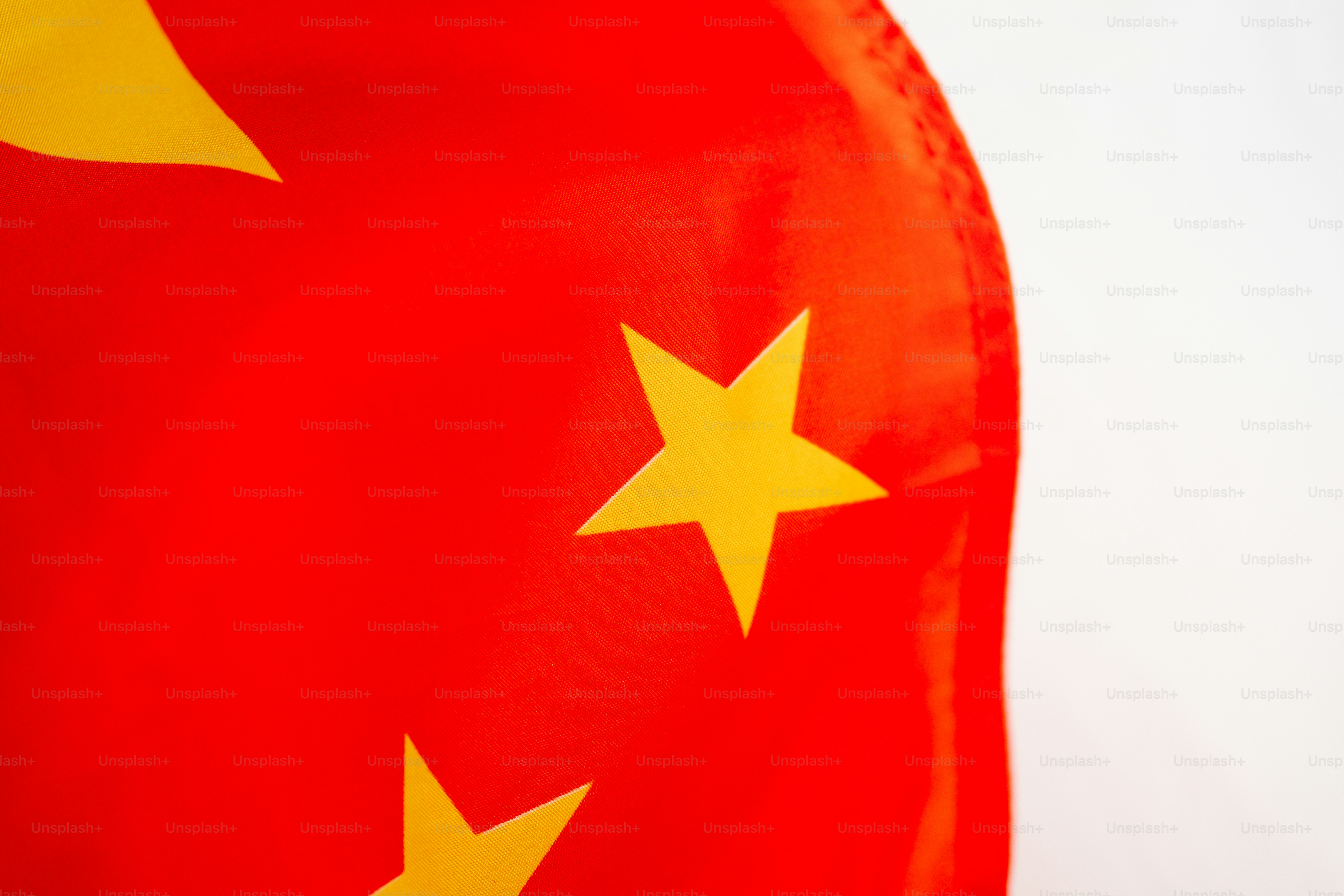 A close up of a red and yellow flag photo – China Image on Unsplash