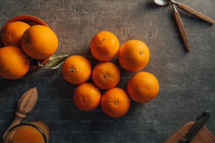 a bunch of oranges sitting on top of a table