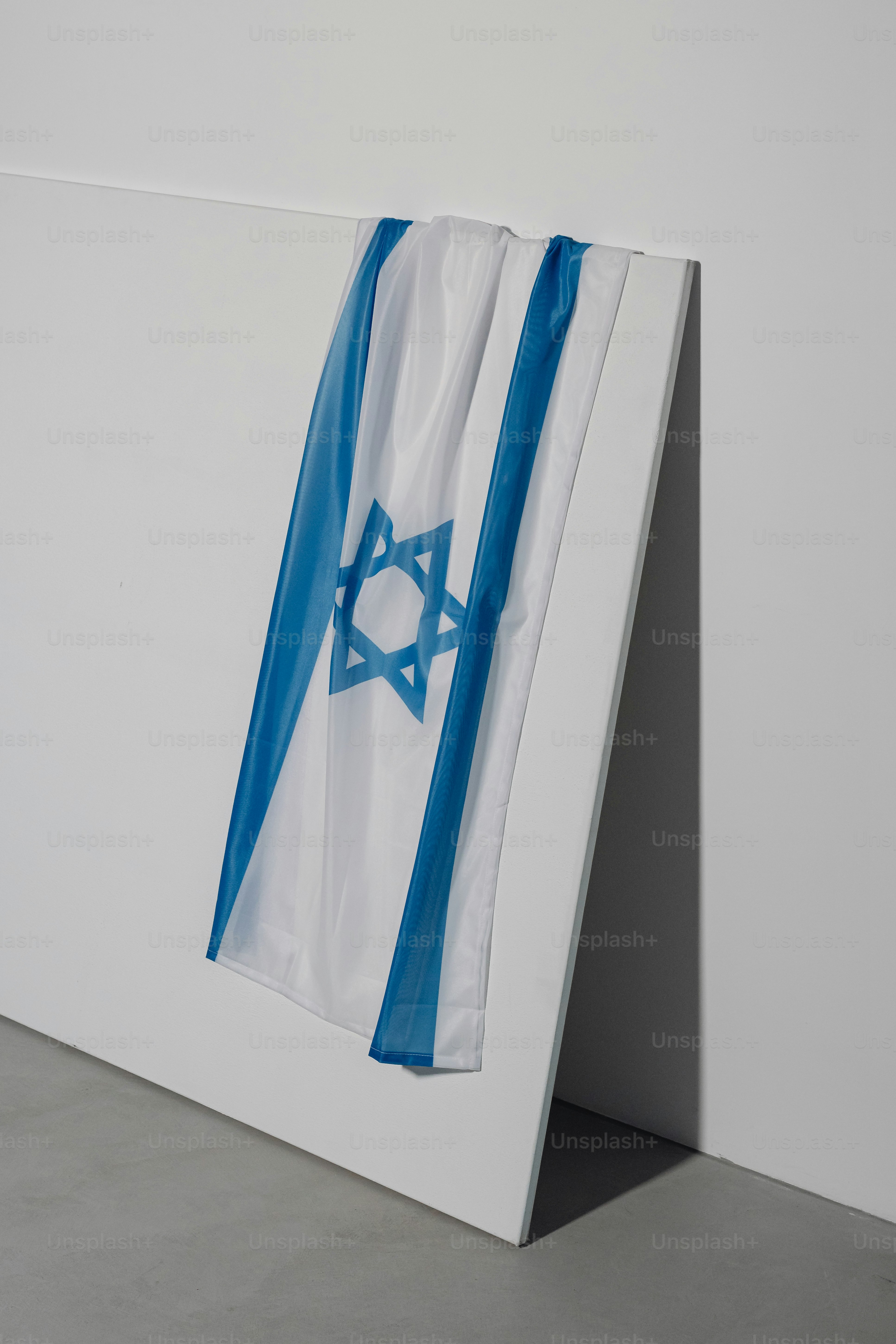 a picture of a star of david hanging on a wall