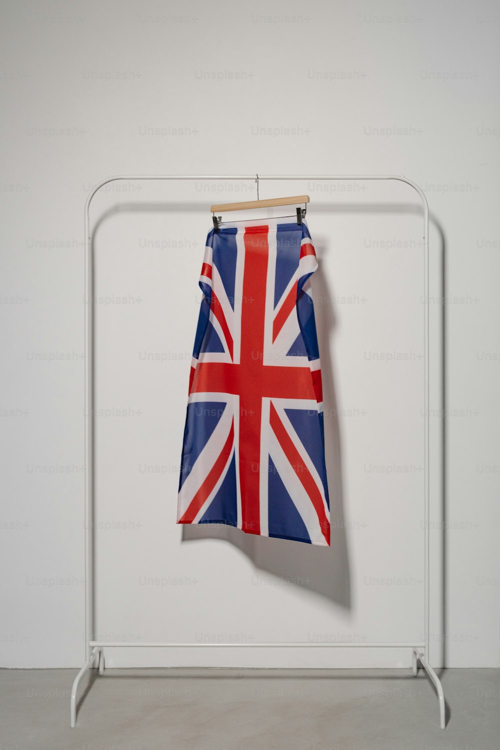 a british flag hanging on a clothes rack