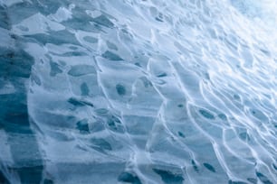 a close up view of the ice on the water