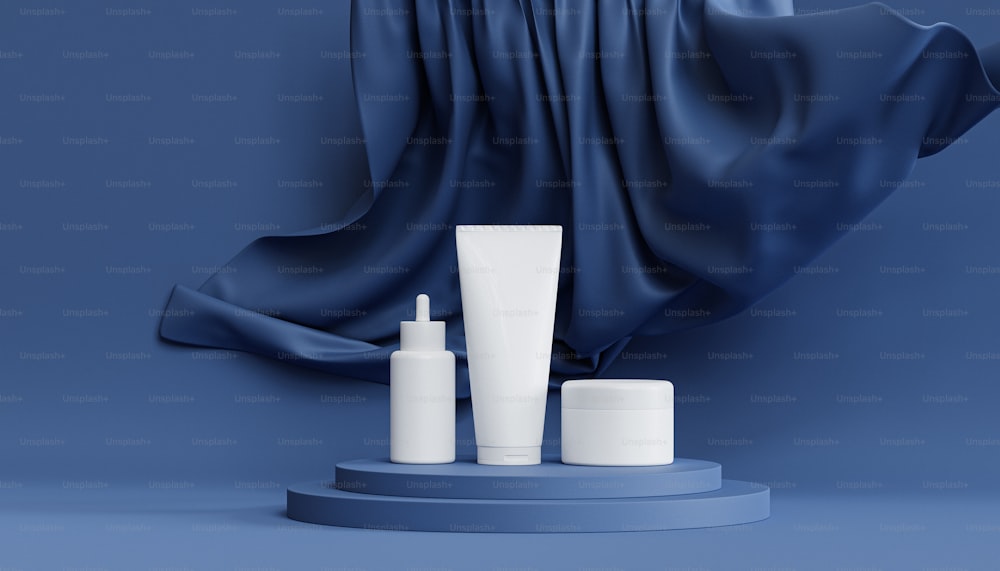 a blue background with three white containers and a blue curtain