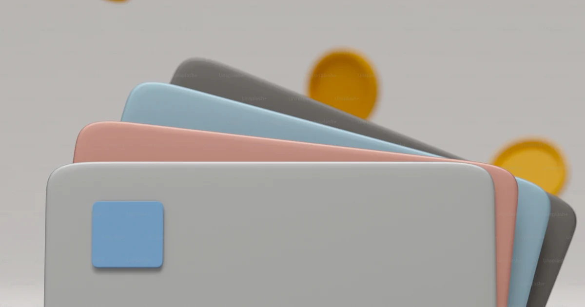 Card Stat Coin A stack of credit cards with a bunch of coins coming out of it photo ...
