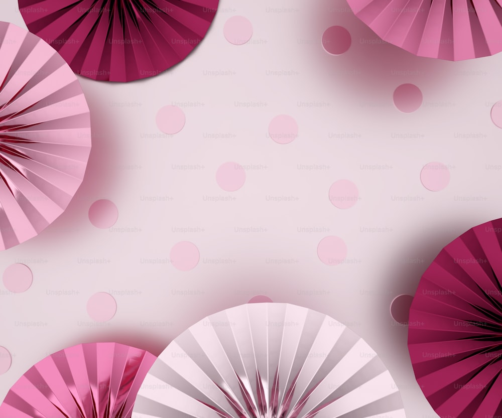 a pink and white background with pink and white paper fans