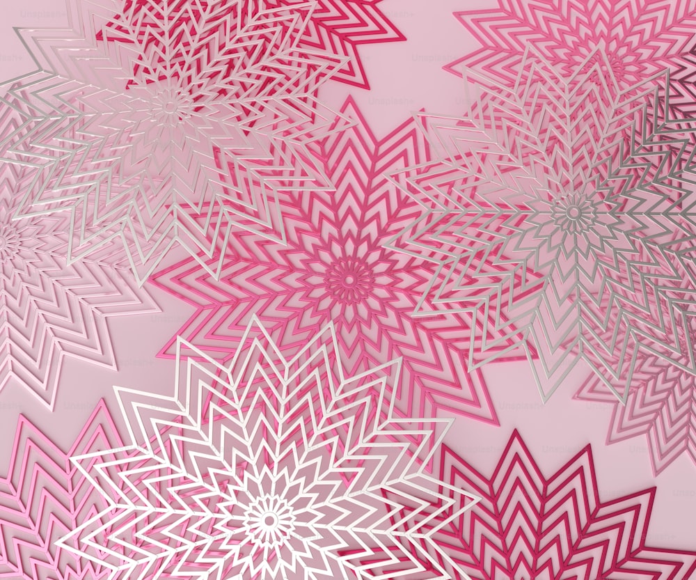 Un primer plano de papel rosa y plateado con copos de nieve