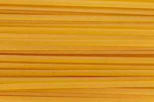 a close up of a bunch of yellow pasta