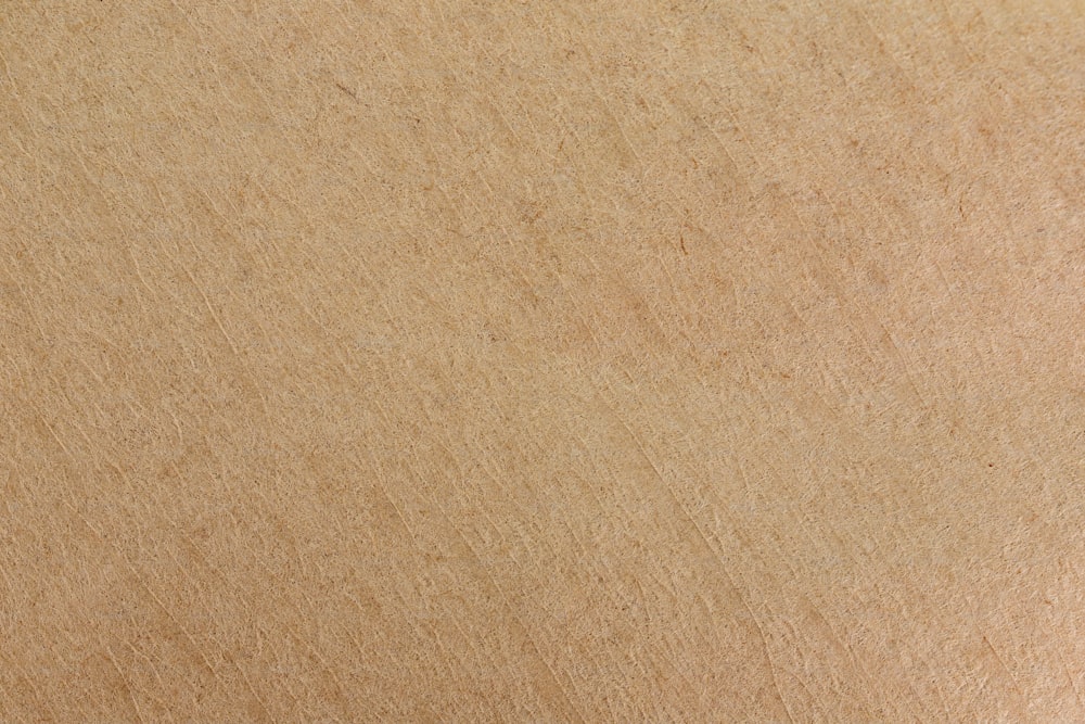 a close up of a piece of brown cardboard