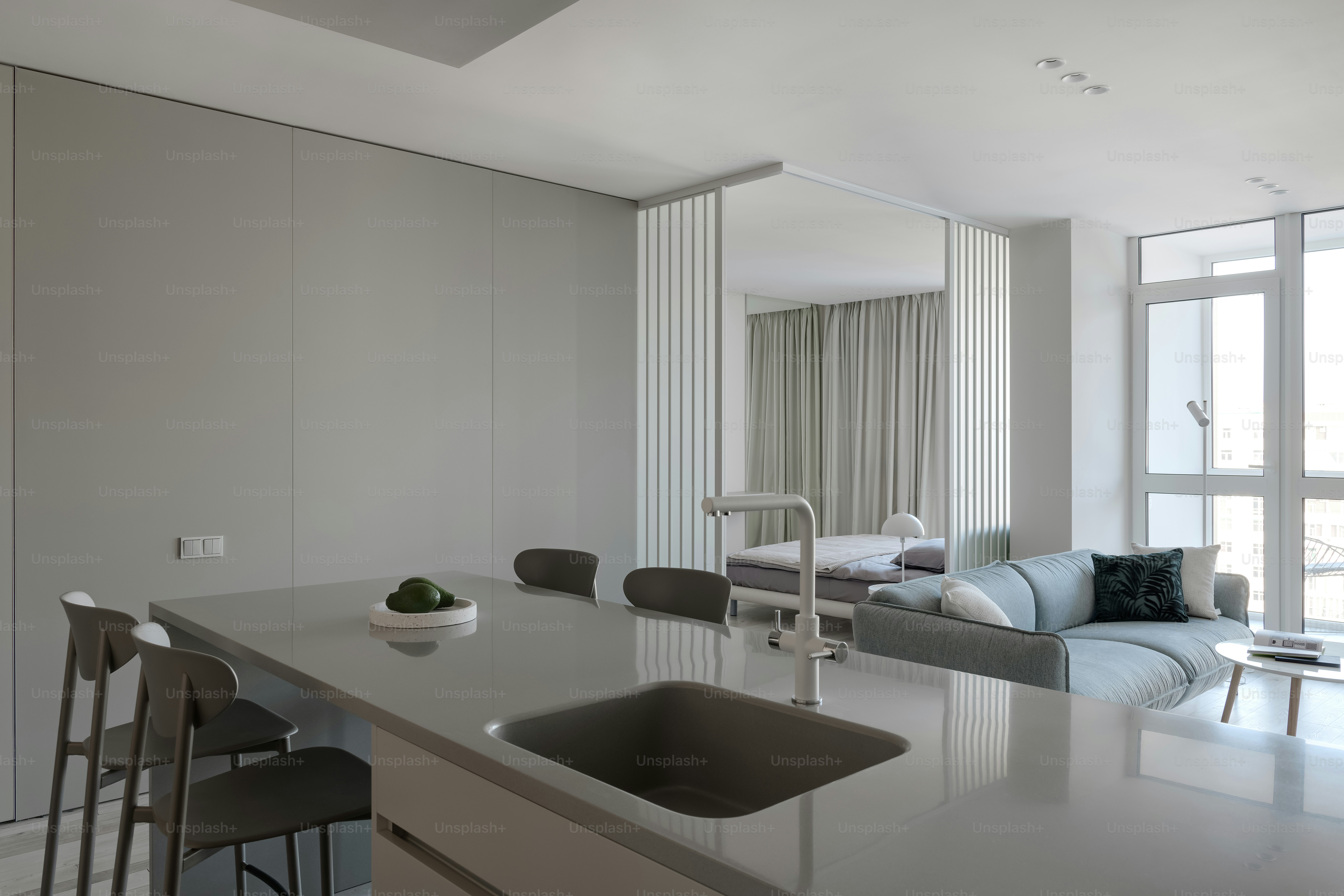 a kitchen with a sink and a counter top