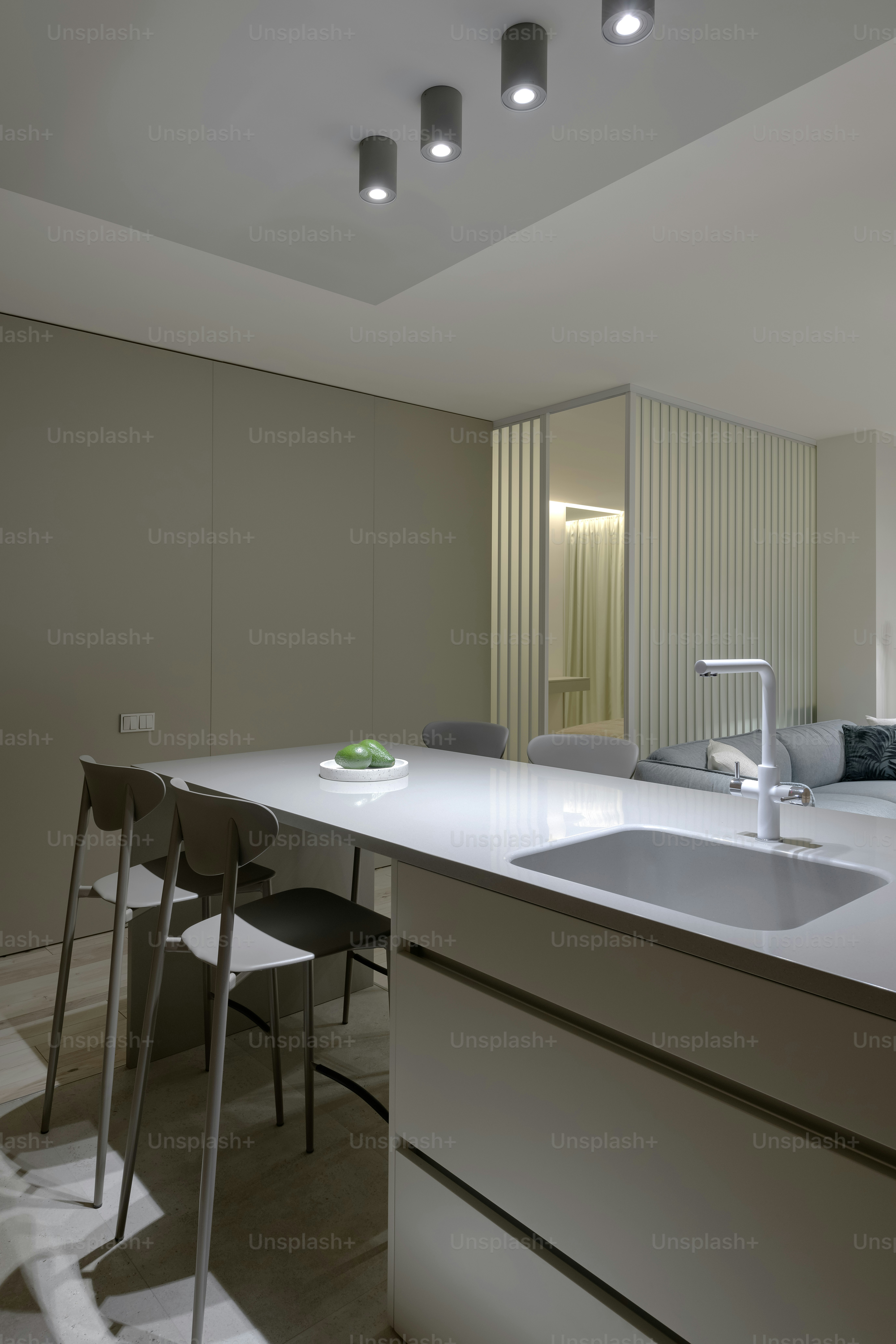 a kitchen with a sink and a counter top