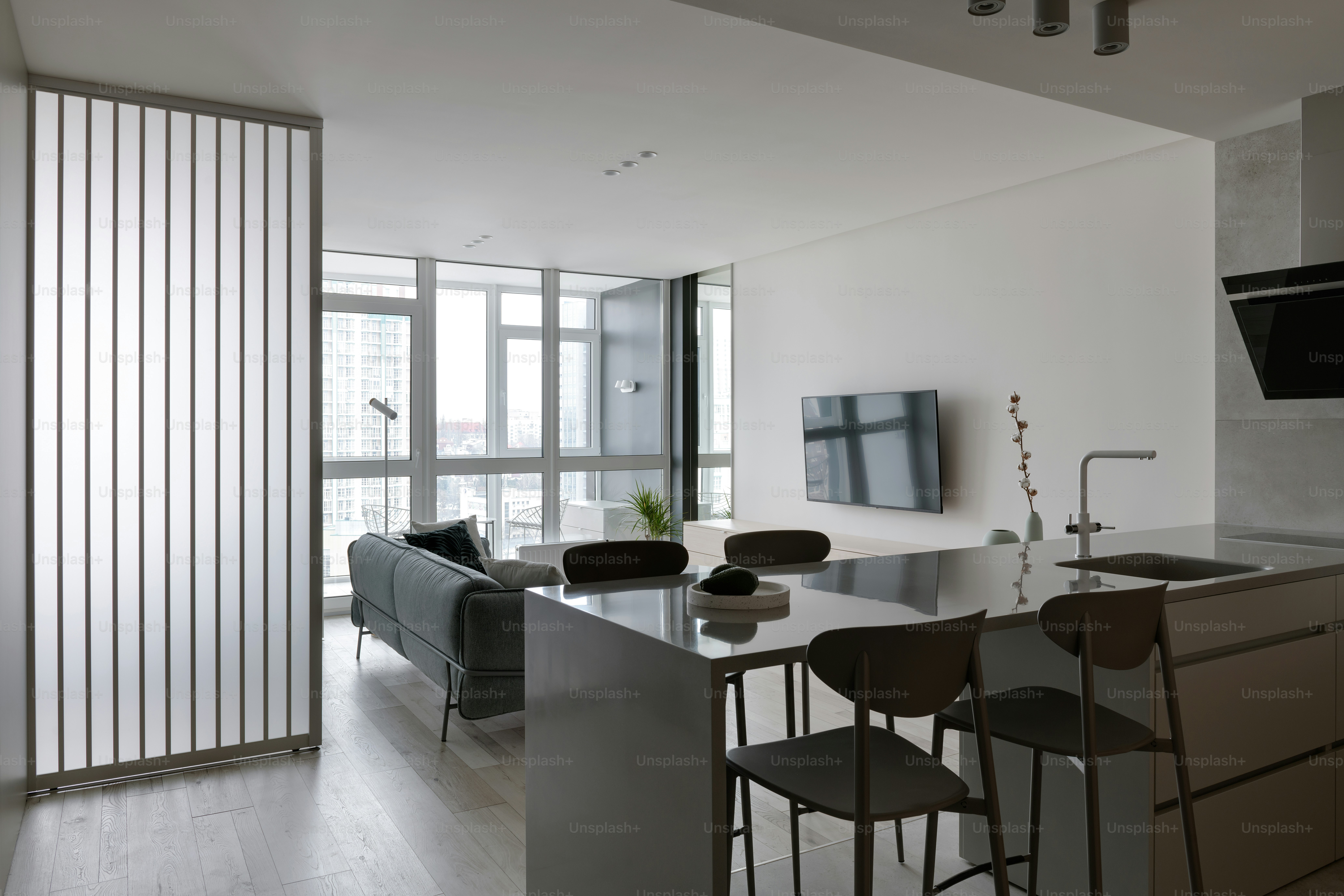 a living room with a couch a table and a tv