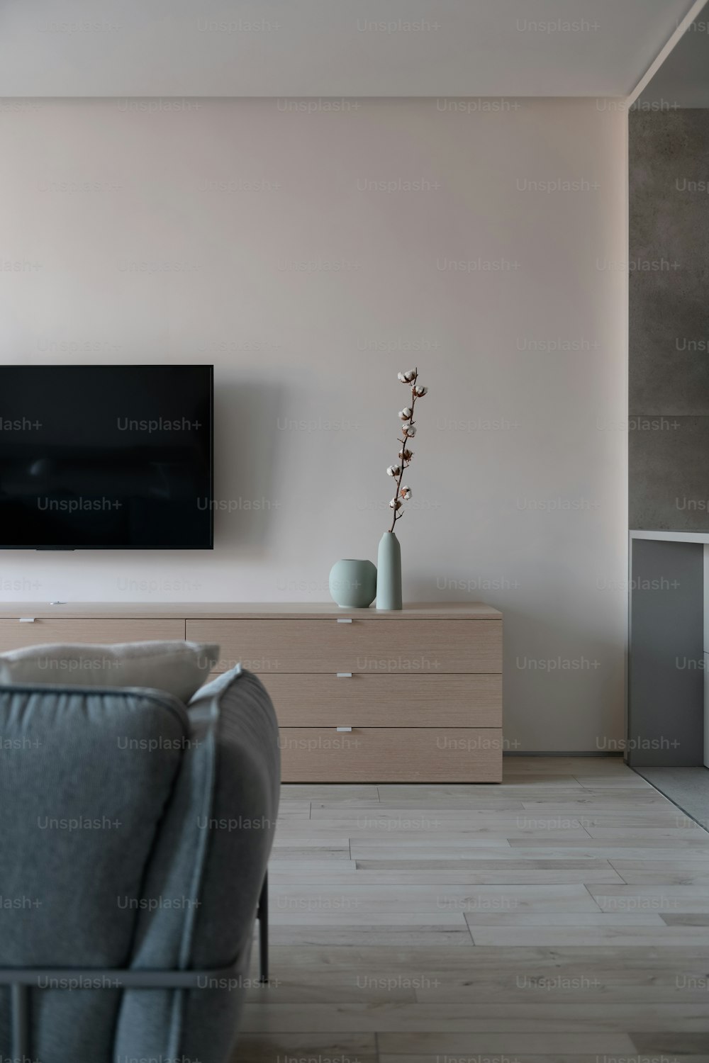 a living room with a couch and a television