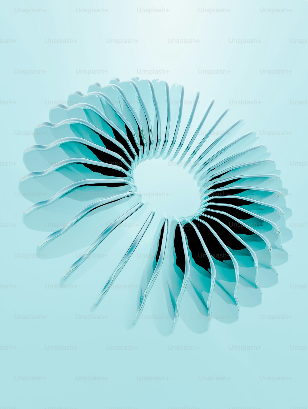 a circular object made out of scissors on a blue background