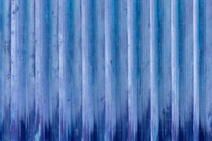 a blue background with vertical lines in the middle