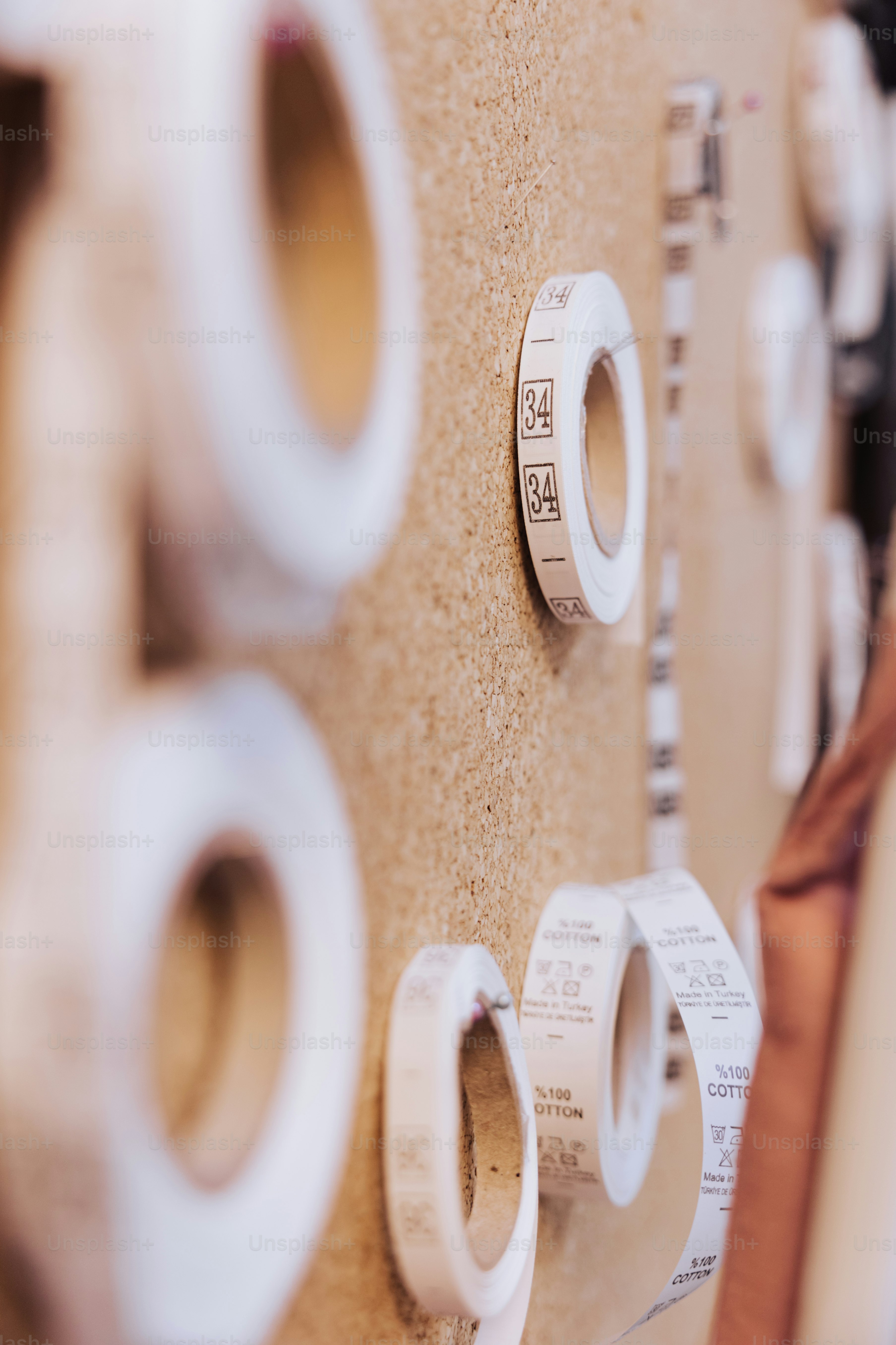 a bathroom wall with a lot of toilet paper on it