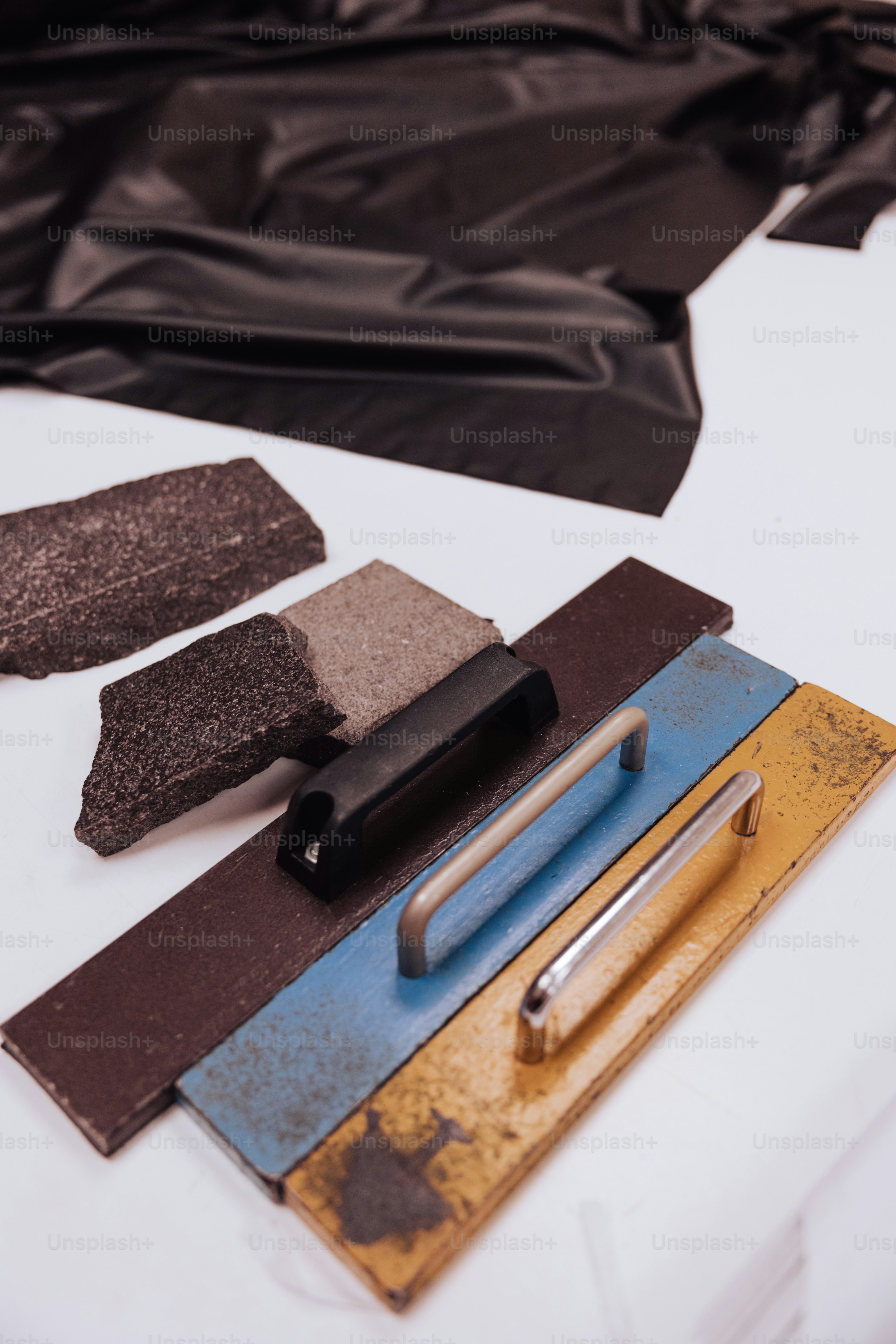 a white table topped with lots of different colored papers