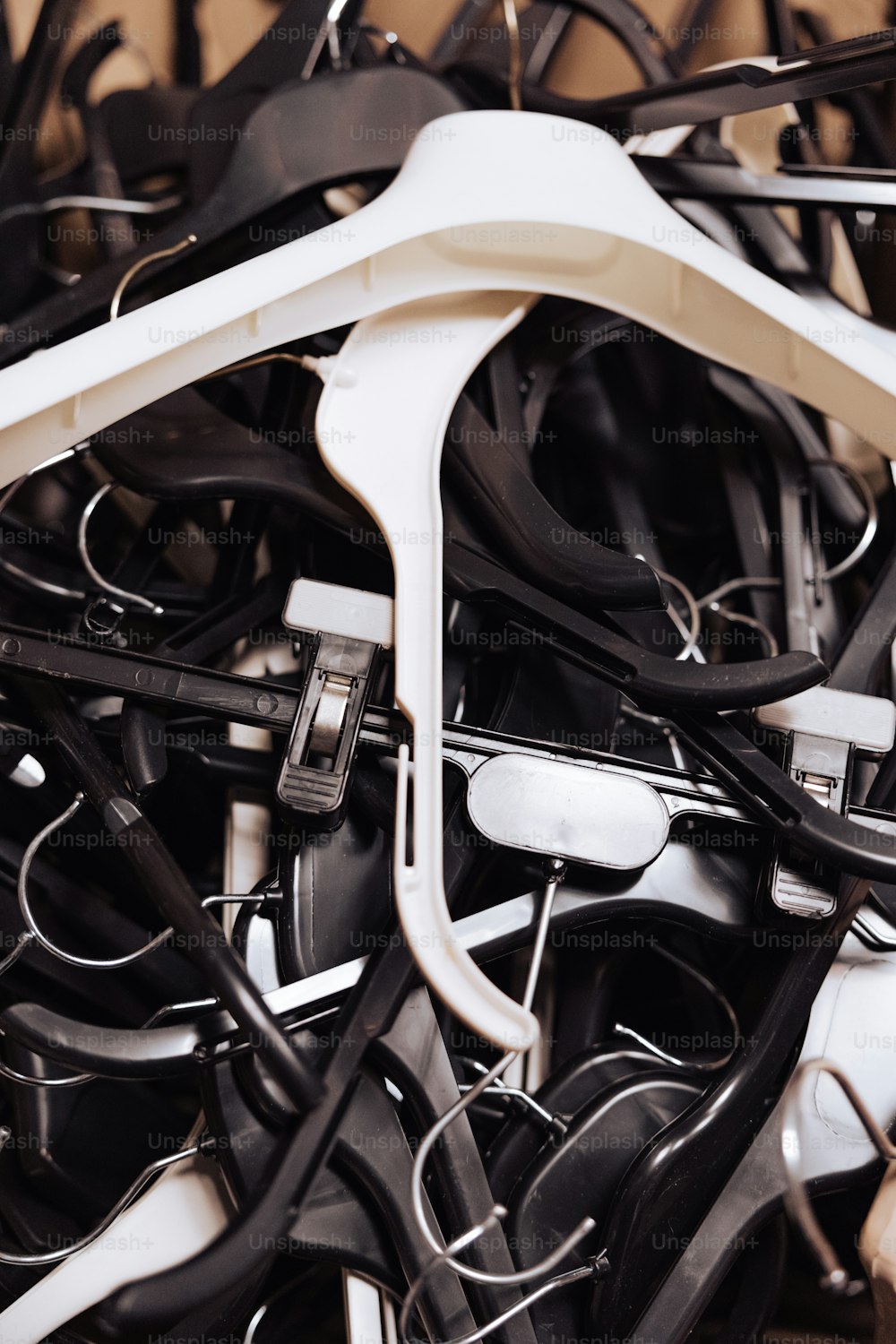 a pile of black and white wires and cords