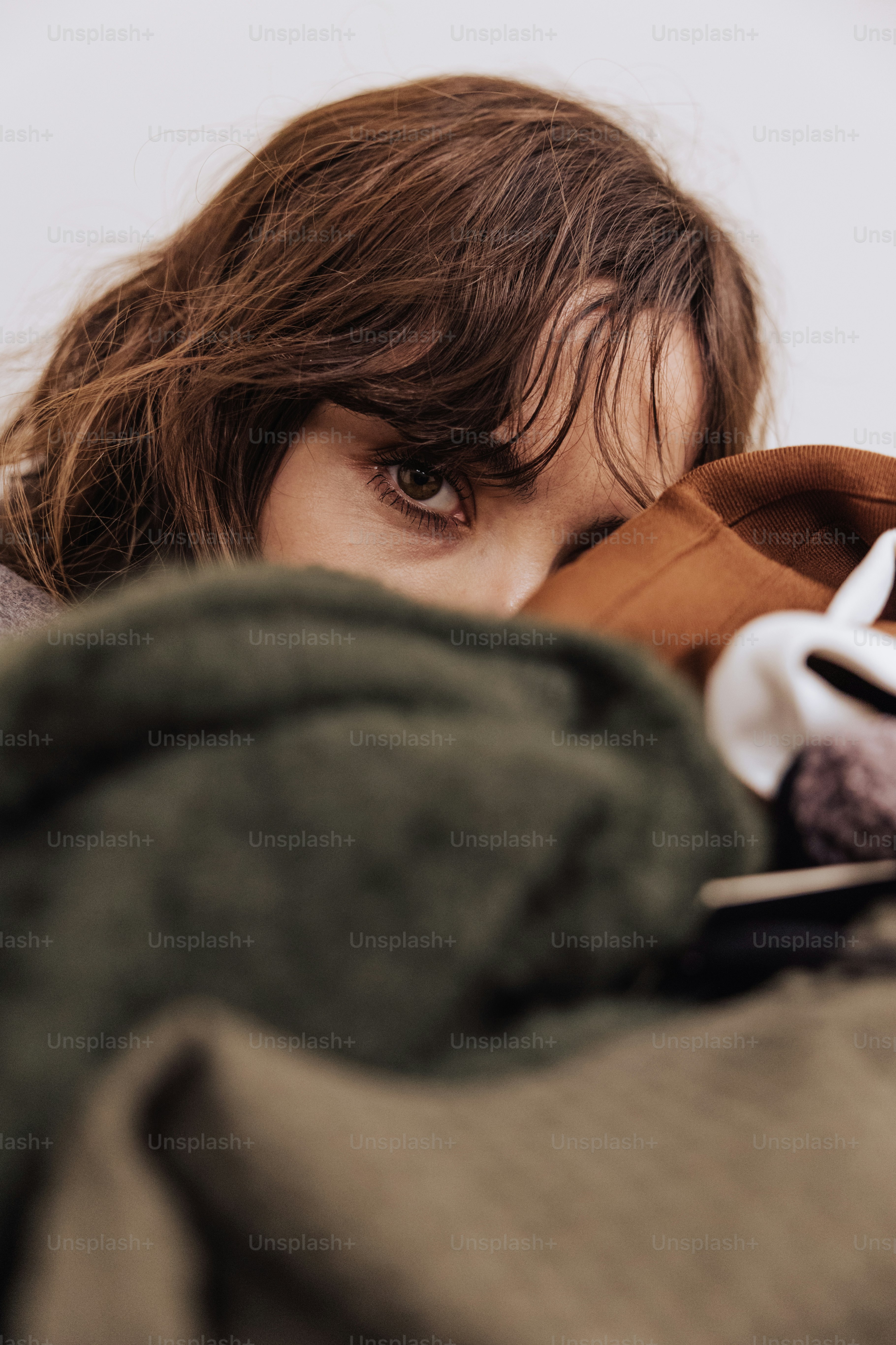 a close up of a person holding a cell phone