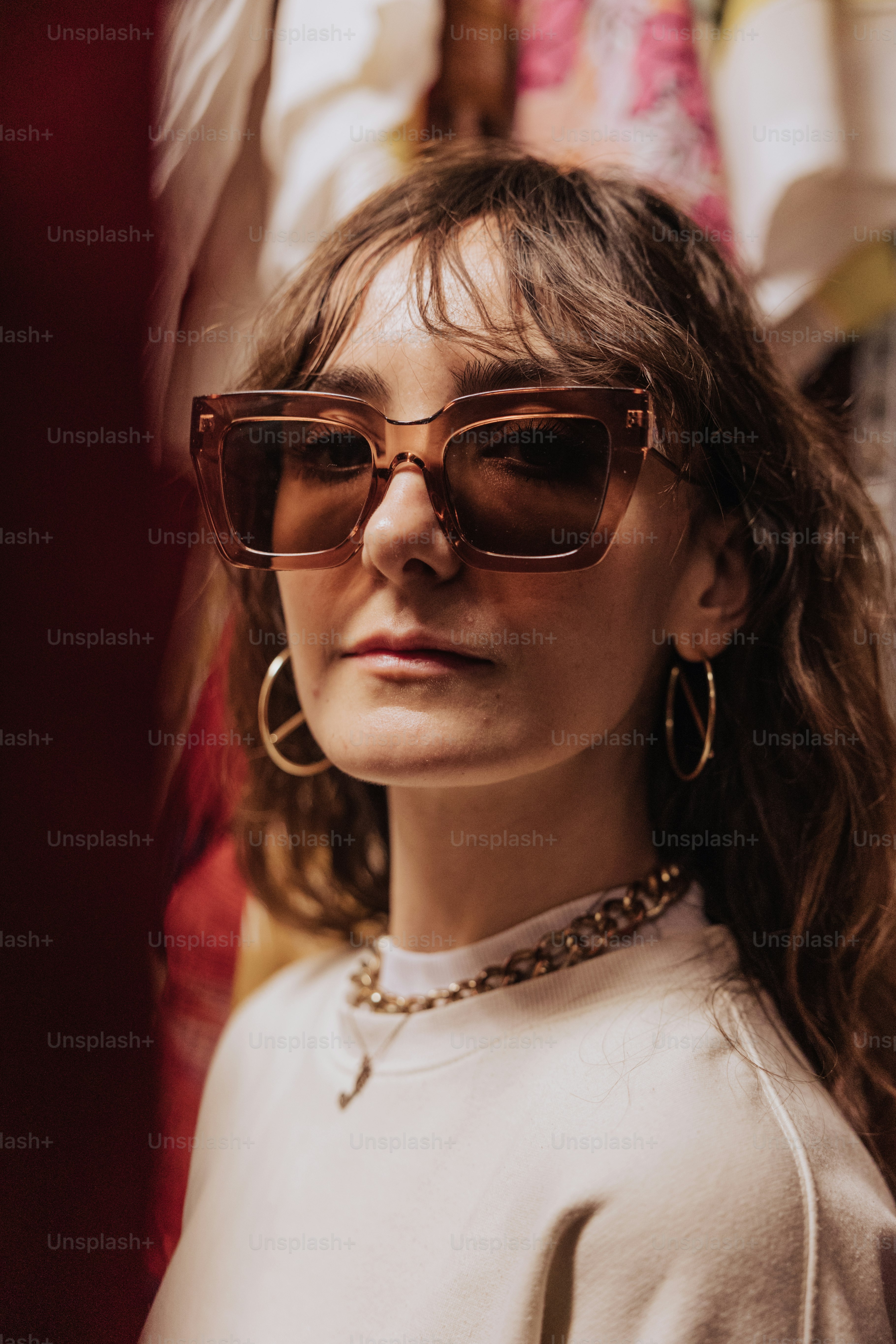 A woman wearing sunglasses and a white shirt photo – Sunglass Image on ...