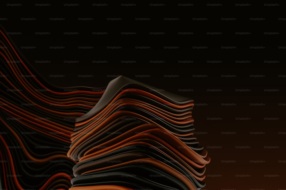 a stack of stacked orange and black papers