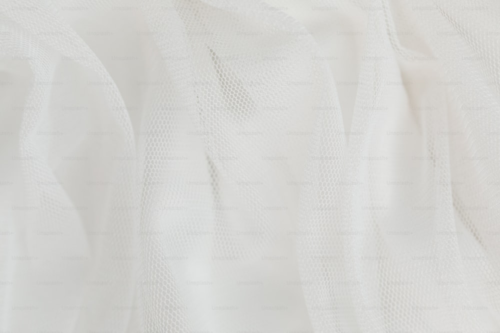 Gros plan d’un tissu transparent blanc