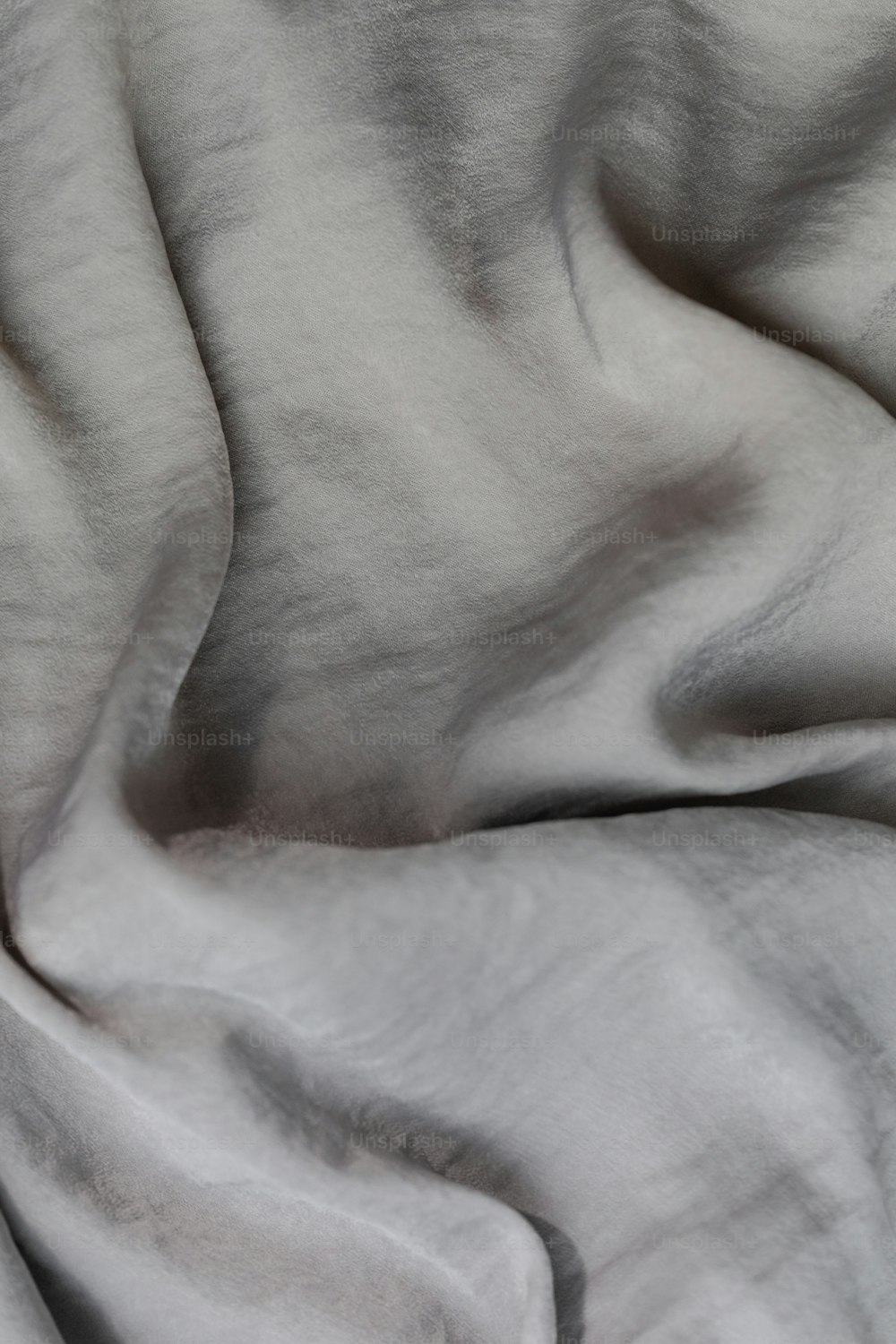 a close up view of a white blanket