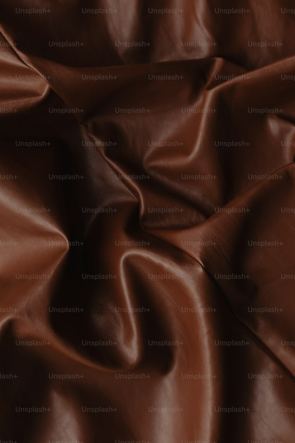 a close up of a brown leather texture