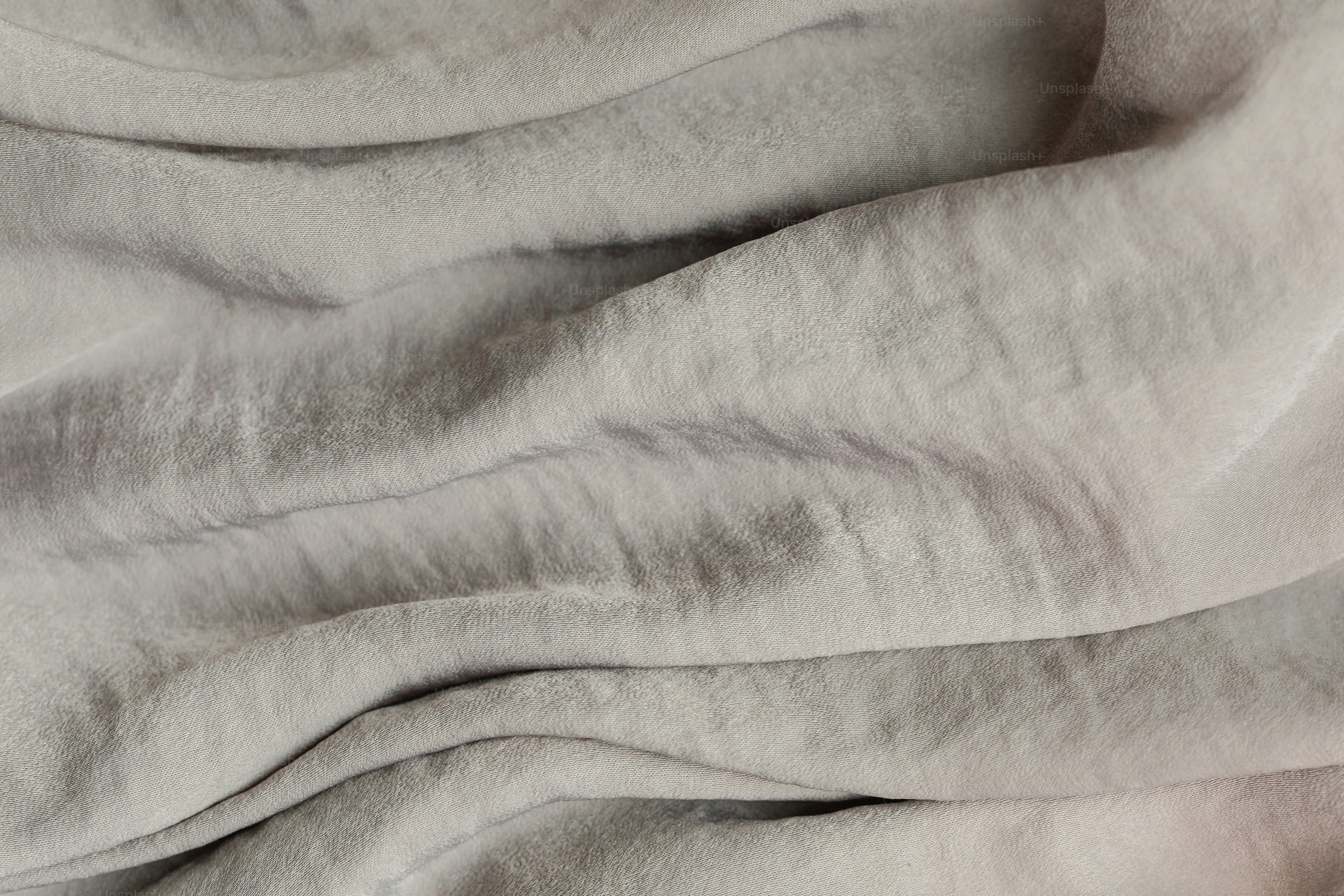 a close up of a blanket with a white background