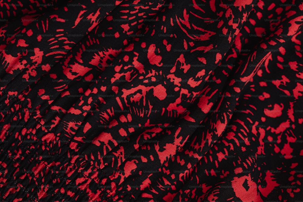 a red and black floral print fabric