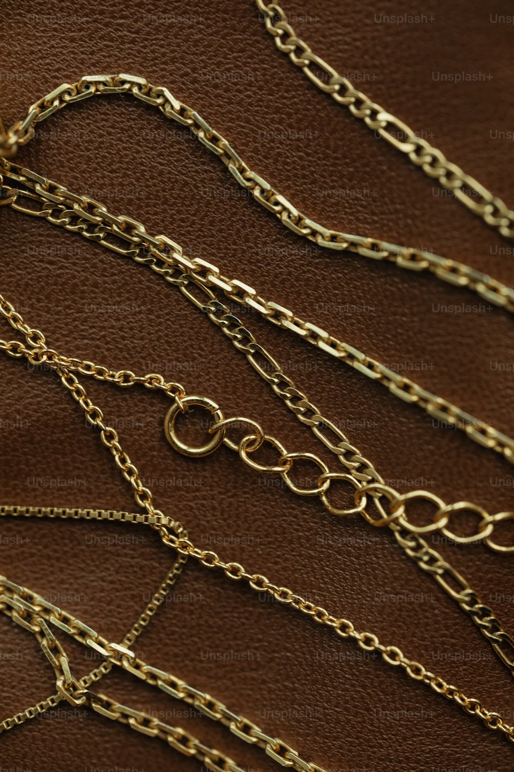 a close up of a bunch of gold chains
