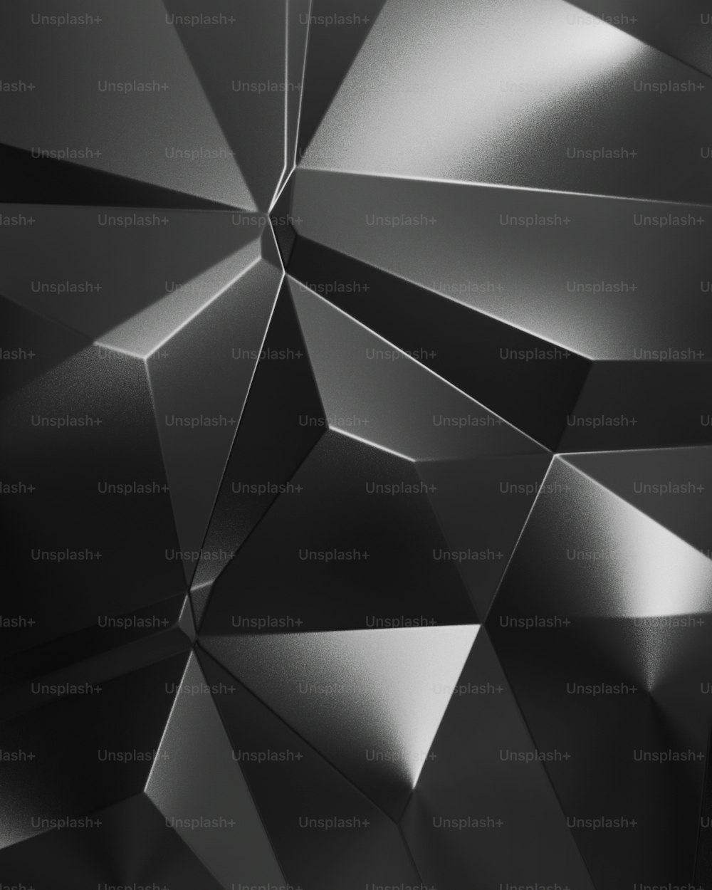 Une photo en noir et blanc d’un design abstrait