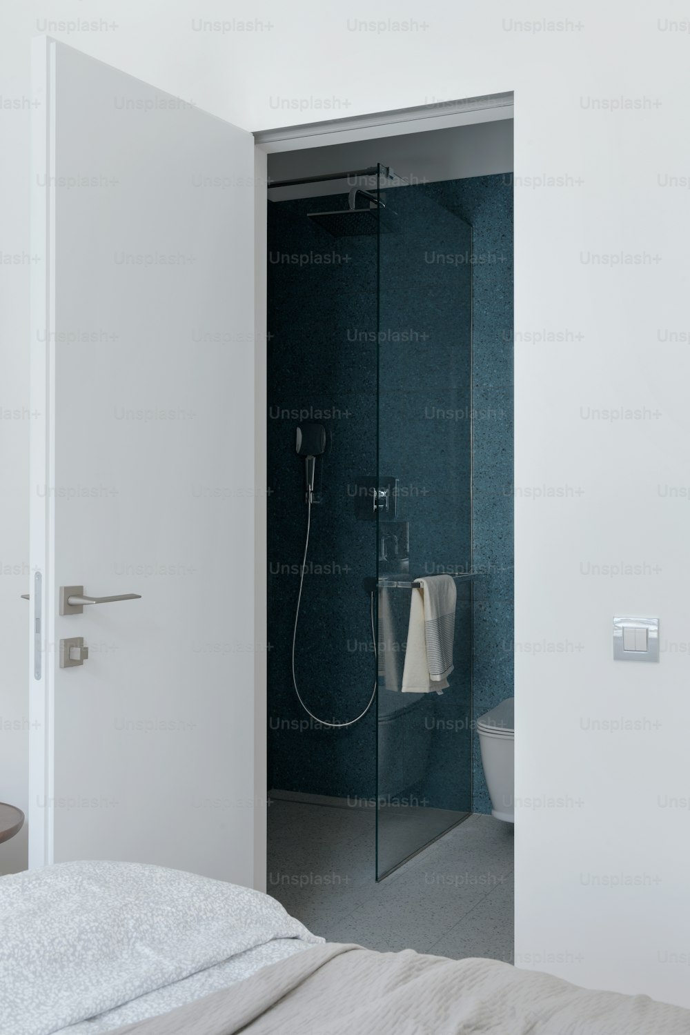 a bathroom with a shower and a toilet in it