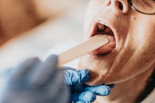 a close up of a person brushing their teeth