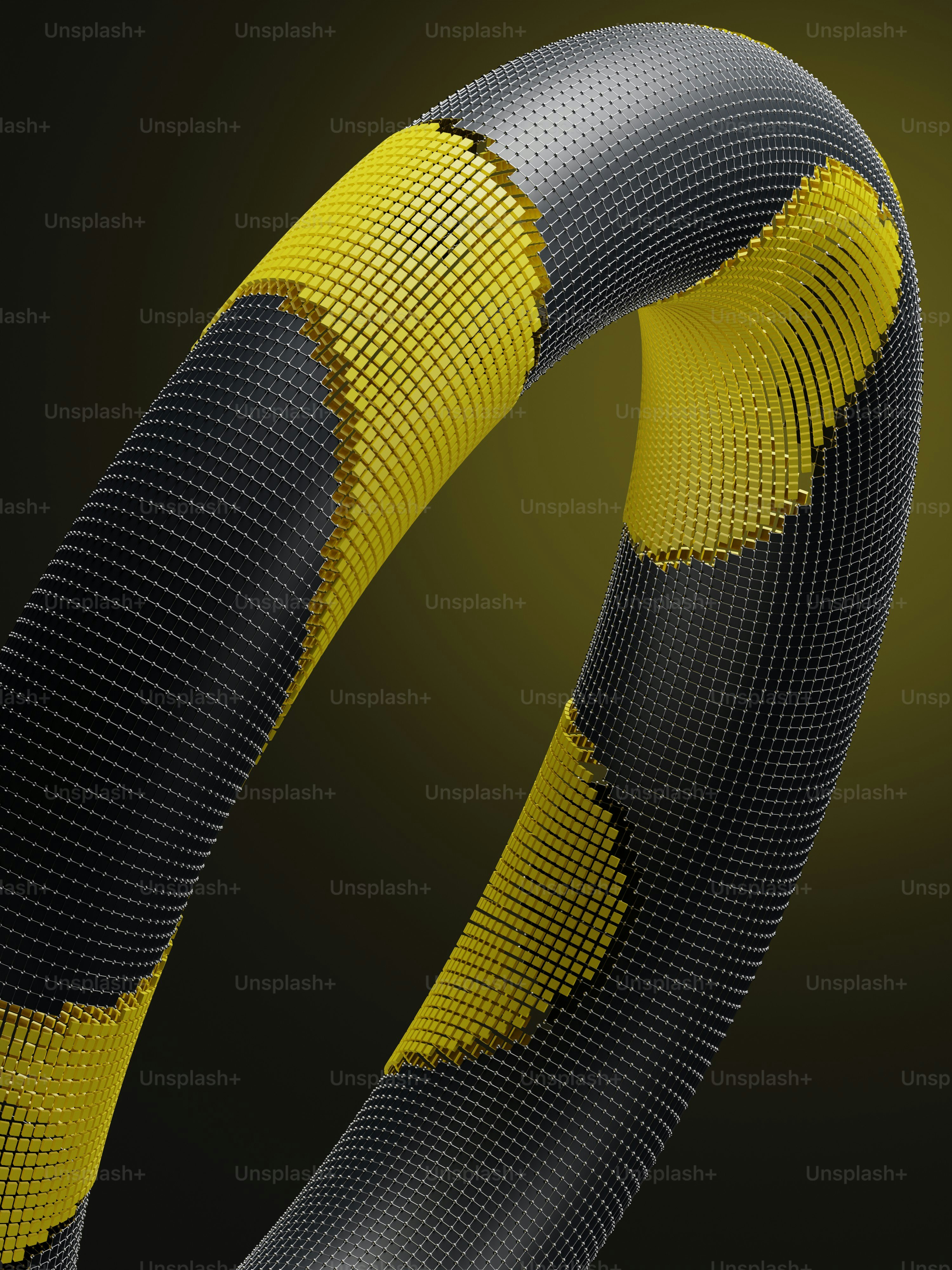 a close up of a black and yellow bracelet